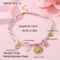 Stainless steel women's necklace with a sun pendant on a regular chain, showing heart and ribbon sun design options.