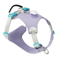 A light purple dog harness with an LED light on the chest, shown on a dog.