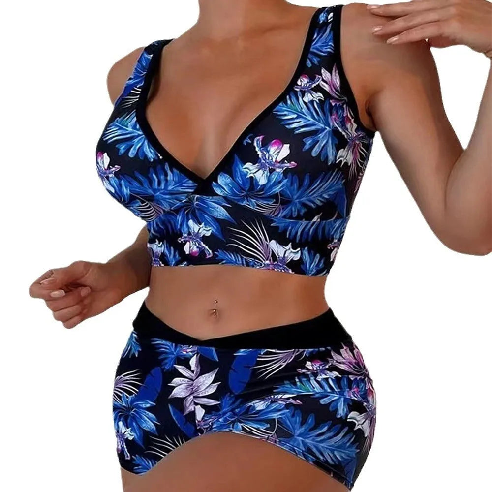 Women's two-piece printed boxer style bikini set in a multi-colour design on polyester fabric.