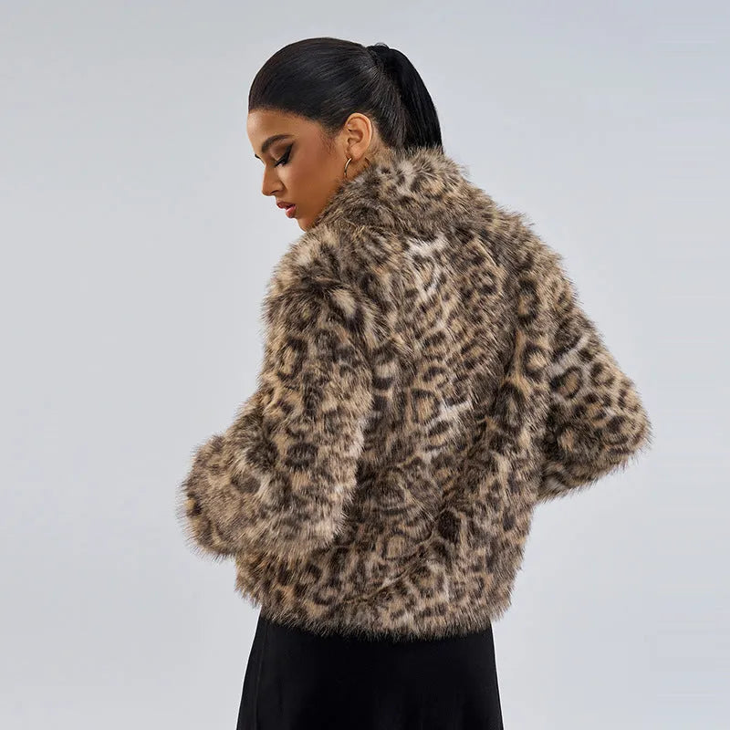 Women's leopard print coat with a buckle lapel and regular sleeves.
