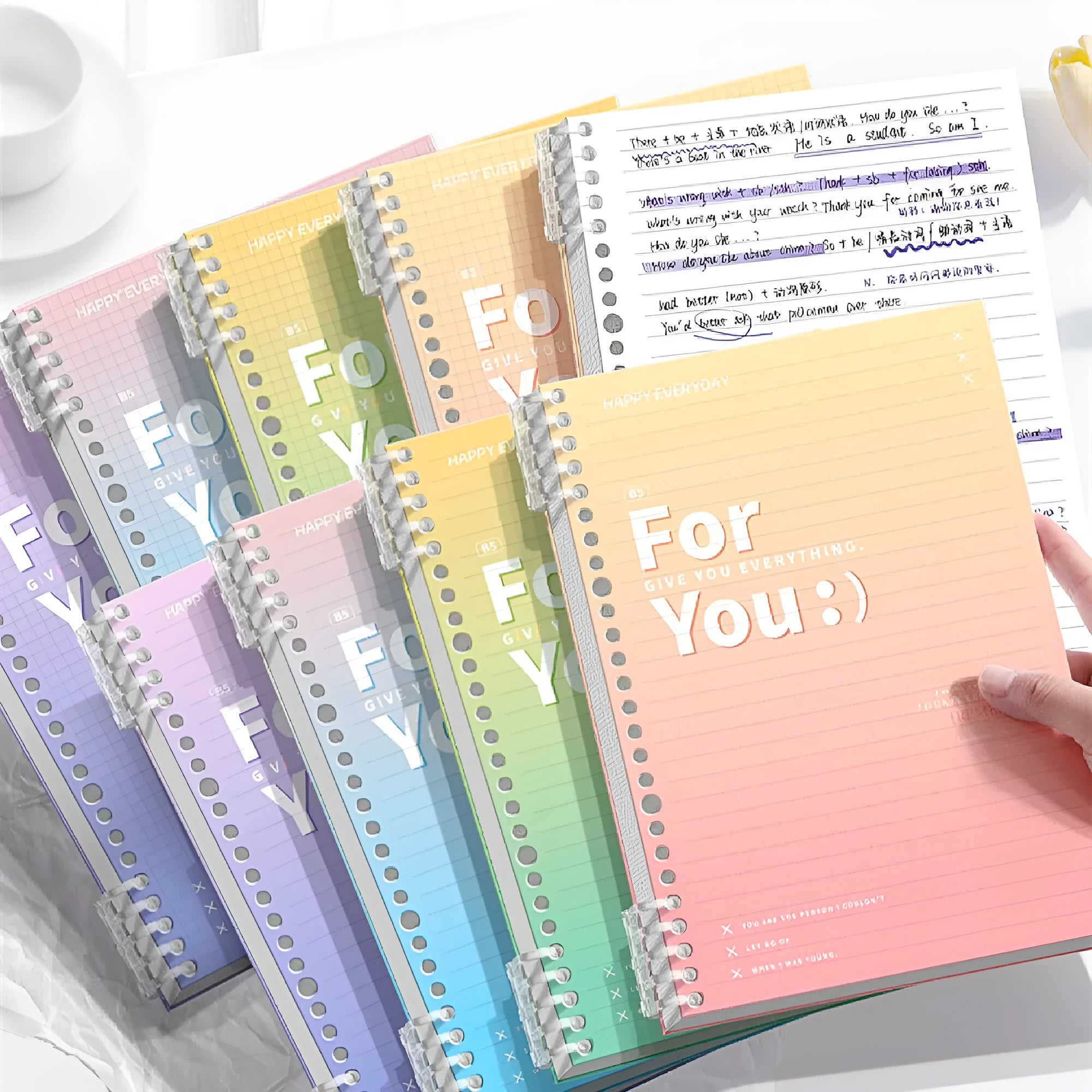 Removable coil gradient notepad showing polypropylene cover and wood-free paper pages in blue colour option