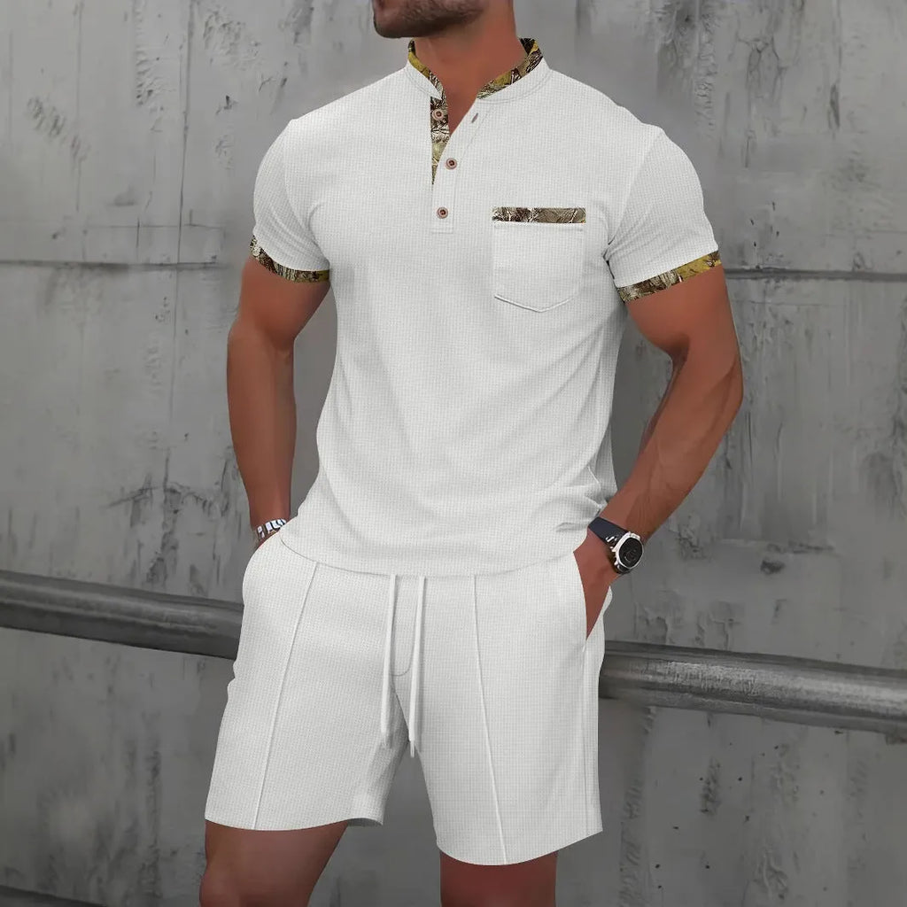 Men's grey zip-up polo collar short sleeve suit with matching shorts laid flat
