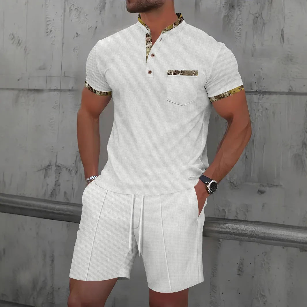Men's grey zip-up polo collar short sleeve suit with matching shorts laid flat