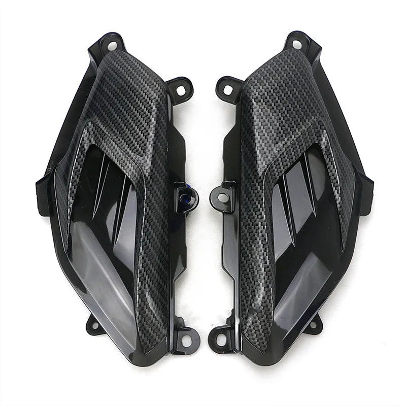 Pair of YAMAHA NMAX scooter side lamps with carbon fibre decoration and blue/red light option.