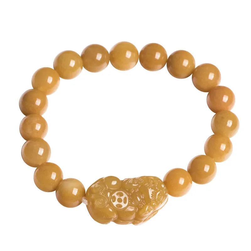 Carved golden thread jade money bracelet showing detail, available in large and small sizes with unisex design.