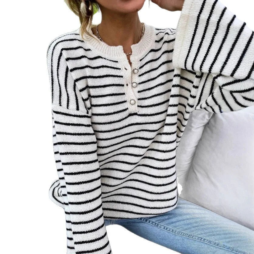 Women's black striped loose top with drop-shoulder sleeves and button details