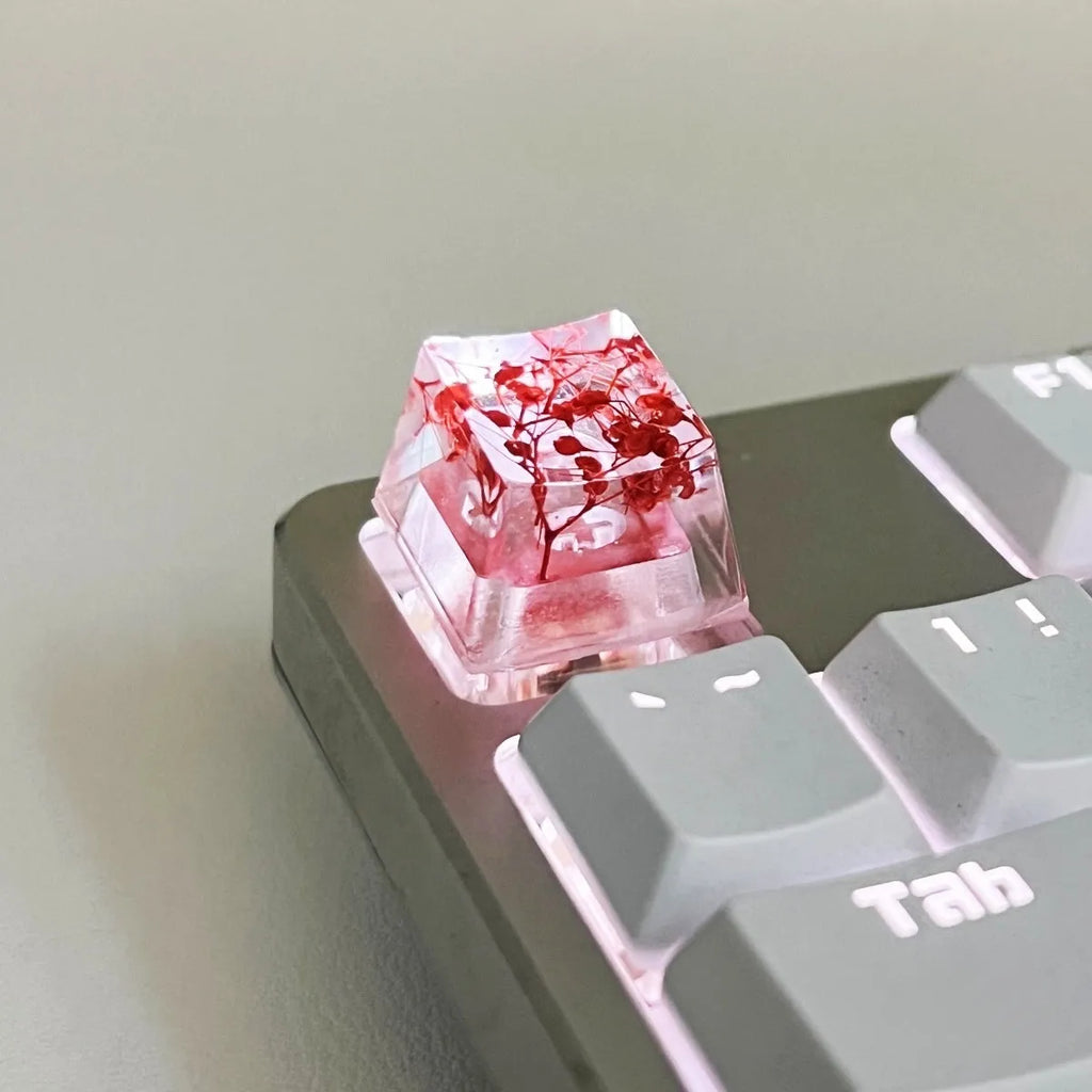 Transparent resin mechanical keyboard keycap with starry sky design in four colour options