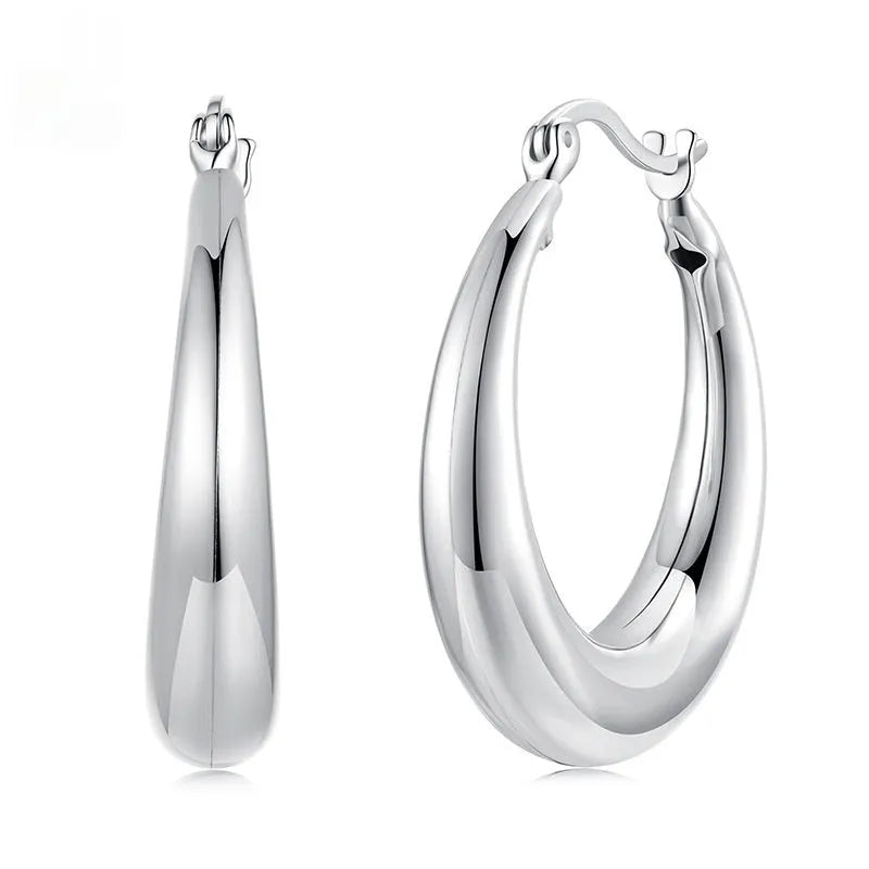 Geometric ring clip-on earrings with copper base and silver electroplated finish