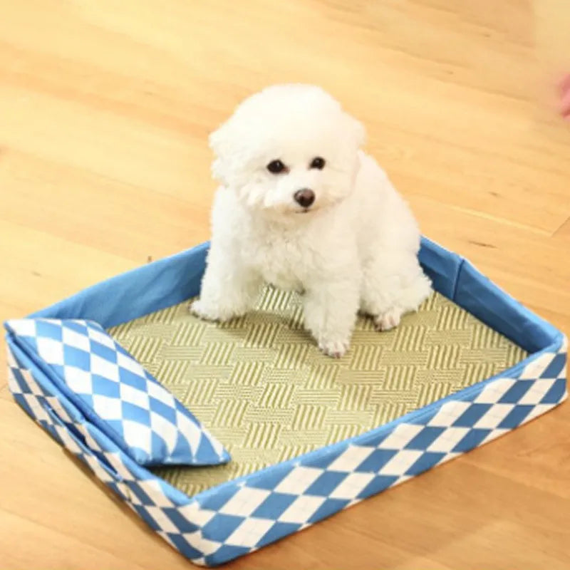 Blue woven rattan cat cooling mat with non-slip base placed on a wooden floor.