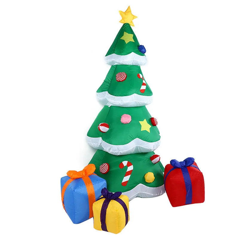Christmas LED inflatable decoration of a glowing Santa Claus figure in a garden at night