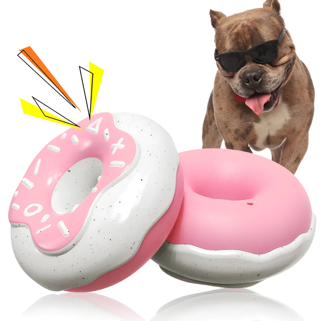 TPR donut-shaped dog chew toy in pink colour with textured surface for dental cleaning