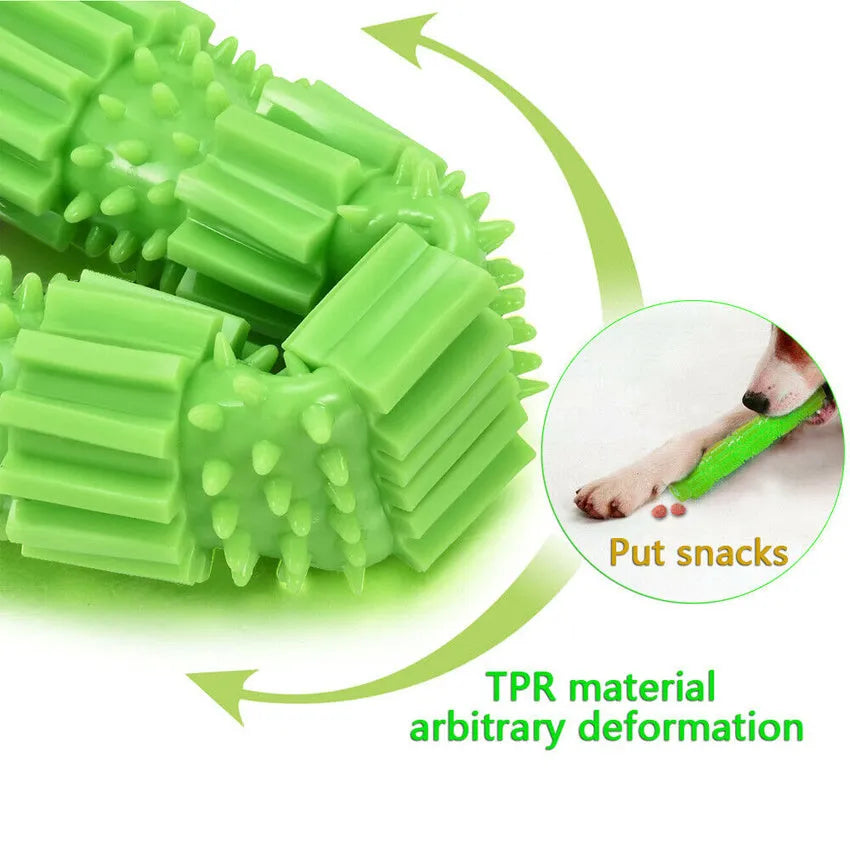 Green and orange rubber dog chew toy with treat dispensing opening and textured cleaning surfaces