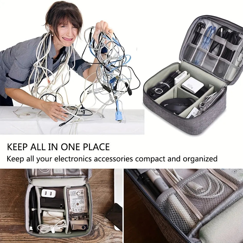 Black waterproof electronics organiser bag open to show removable dividers and mesh pockets for cables.