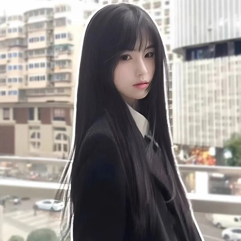 Long straight synthetic wig with bangs in brown black colour showing medium parting style