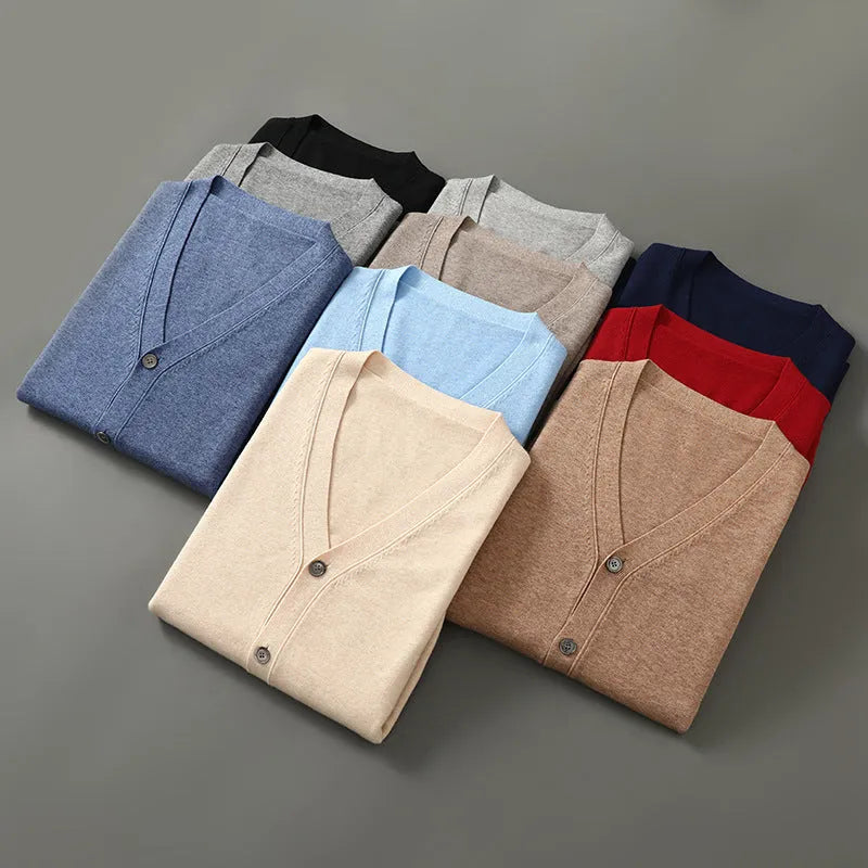Man wearing a beige Andy velvet V-neck cardigan coat with long sleeves