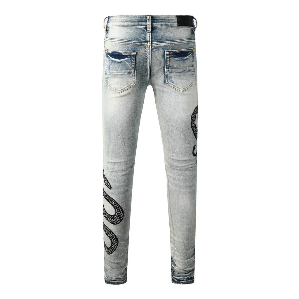 8934Blue distressed skinny jeans with button fly and mid-waist street fashion styling