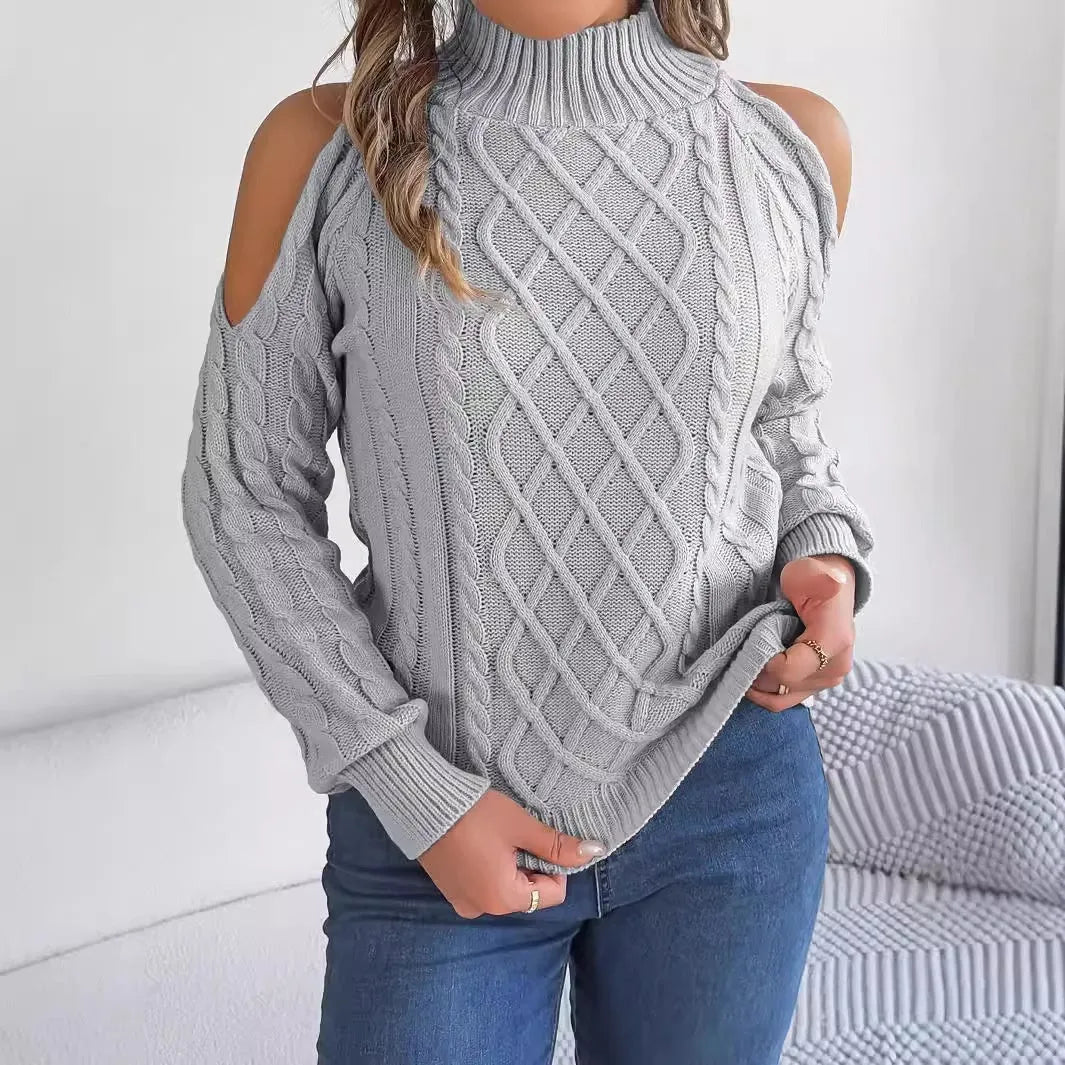 Gray women's acrylic sweater with a twisted knit pattern, half-high collar, and long lantern sleeves on a hanger.