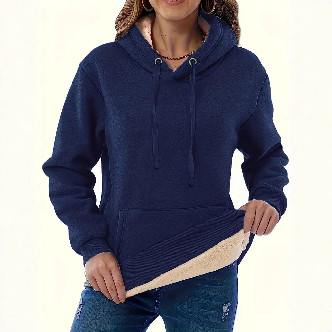Women's loose fit hooded sweater in thick grey polyester fleece with a 3D pattern and front pockets.
