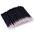 Pack of 100 black disposable eyeliner brushes with fine pointed tips and clear plastic sleeves.