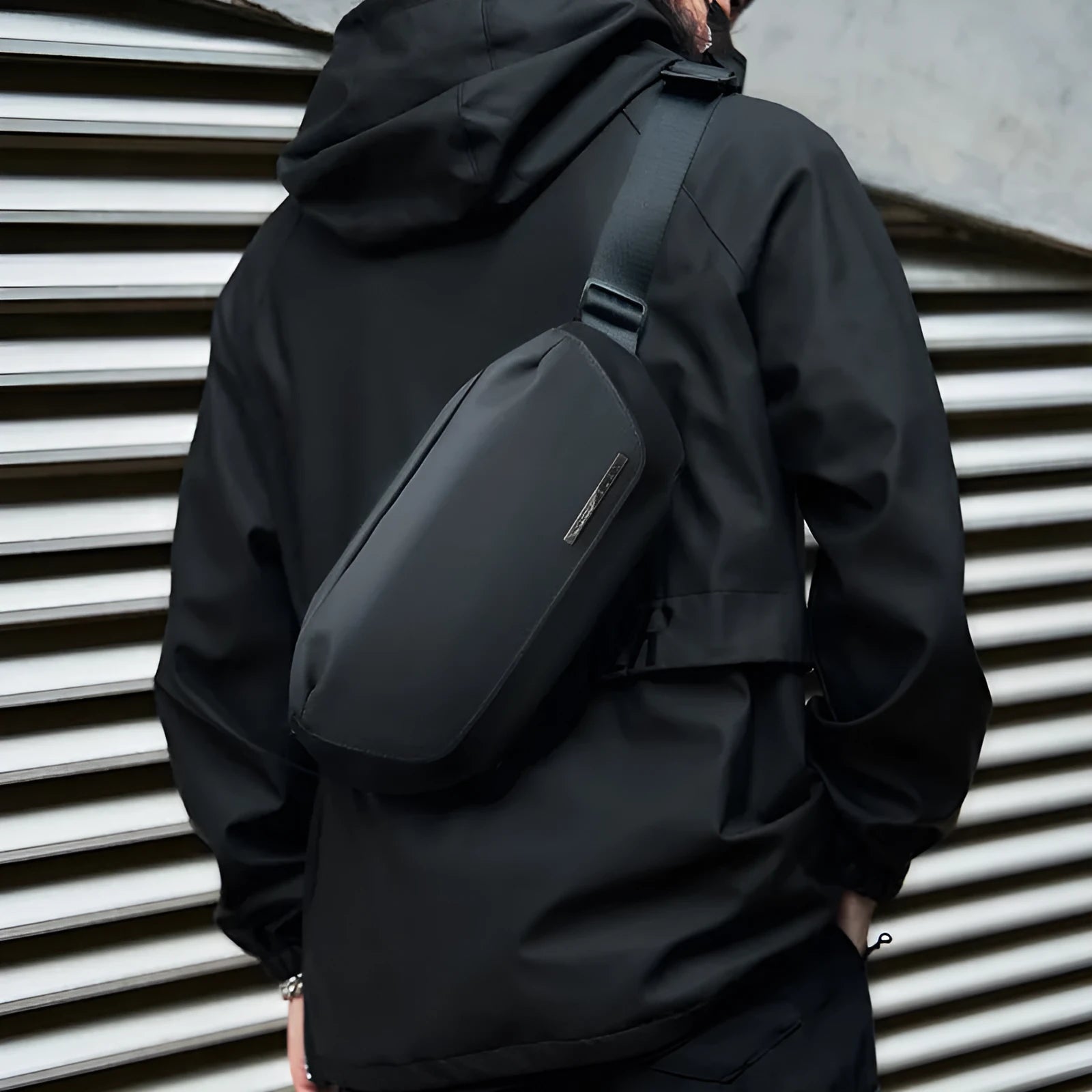 Black Oxford cloth messenger bag with one-shoulder riding design and street style details