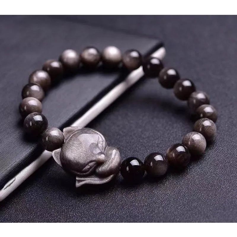 Obsidian bracelet with fox head ring on an adjustable elastic band