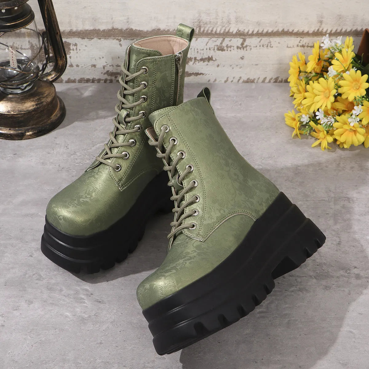 Women's black retro Martin boots with chunky heel, platform sole, and side zip.