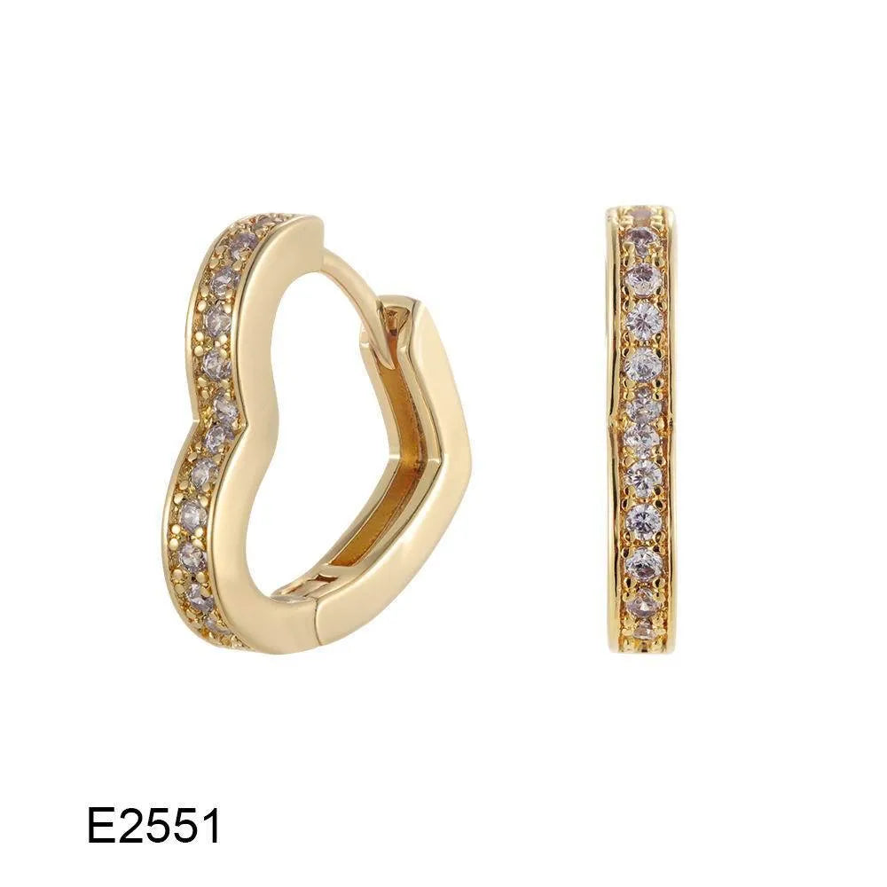 Gold plated heart shape ear clip earrings with crystal accents on white background