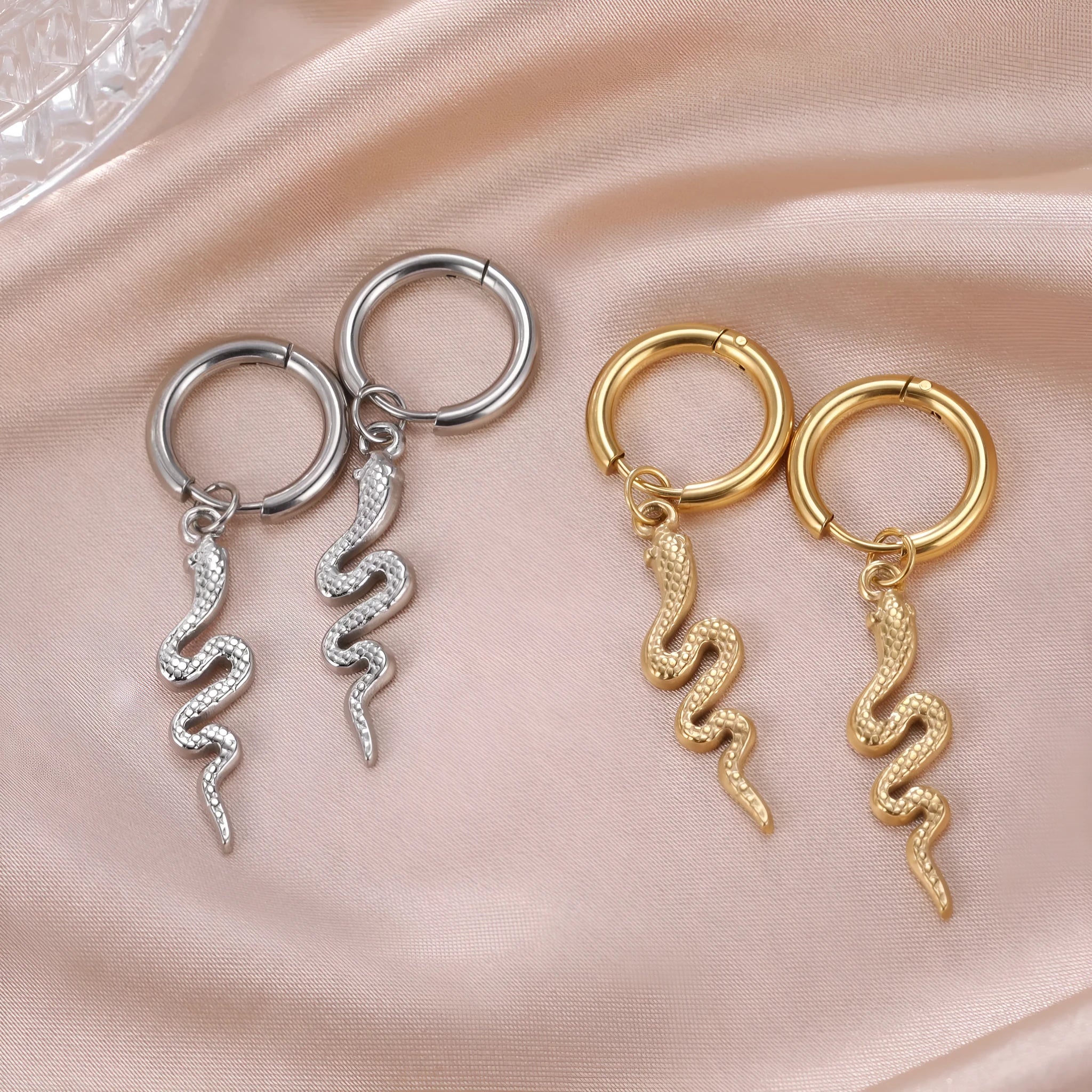 Snake-shaped vintage stainless steel earrings with 18K gold plating and electroplating treatment