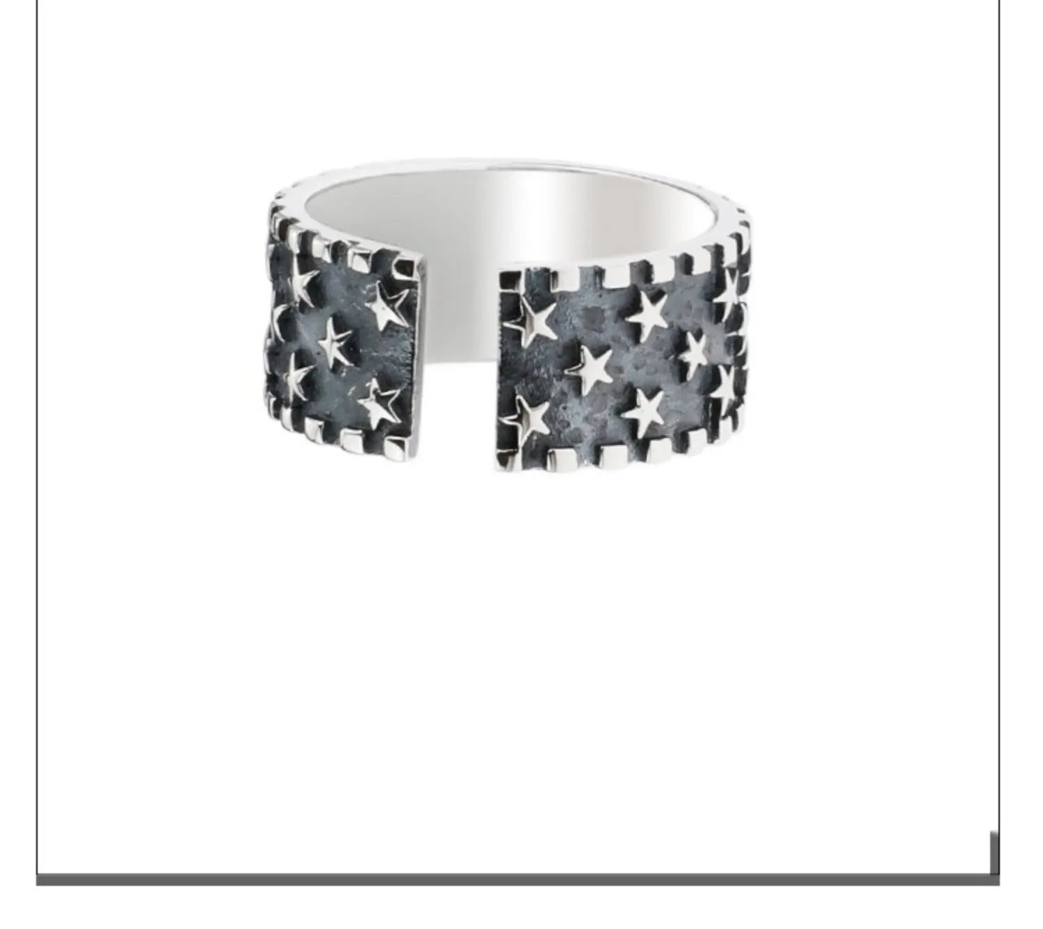 Silver adjustable ring with geometric five pointed star pattern on finger