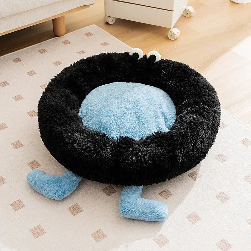Elf Briquettes blue plush kennel-style dog bed or cat bed with raised bolster edges.