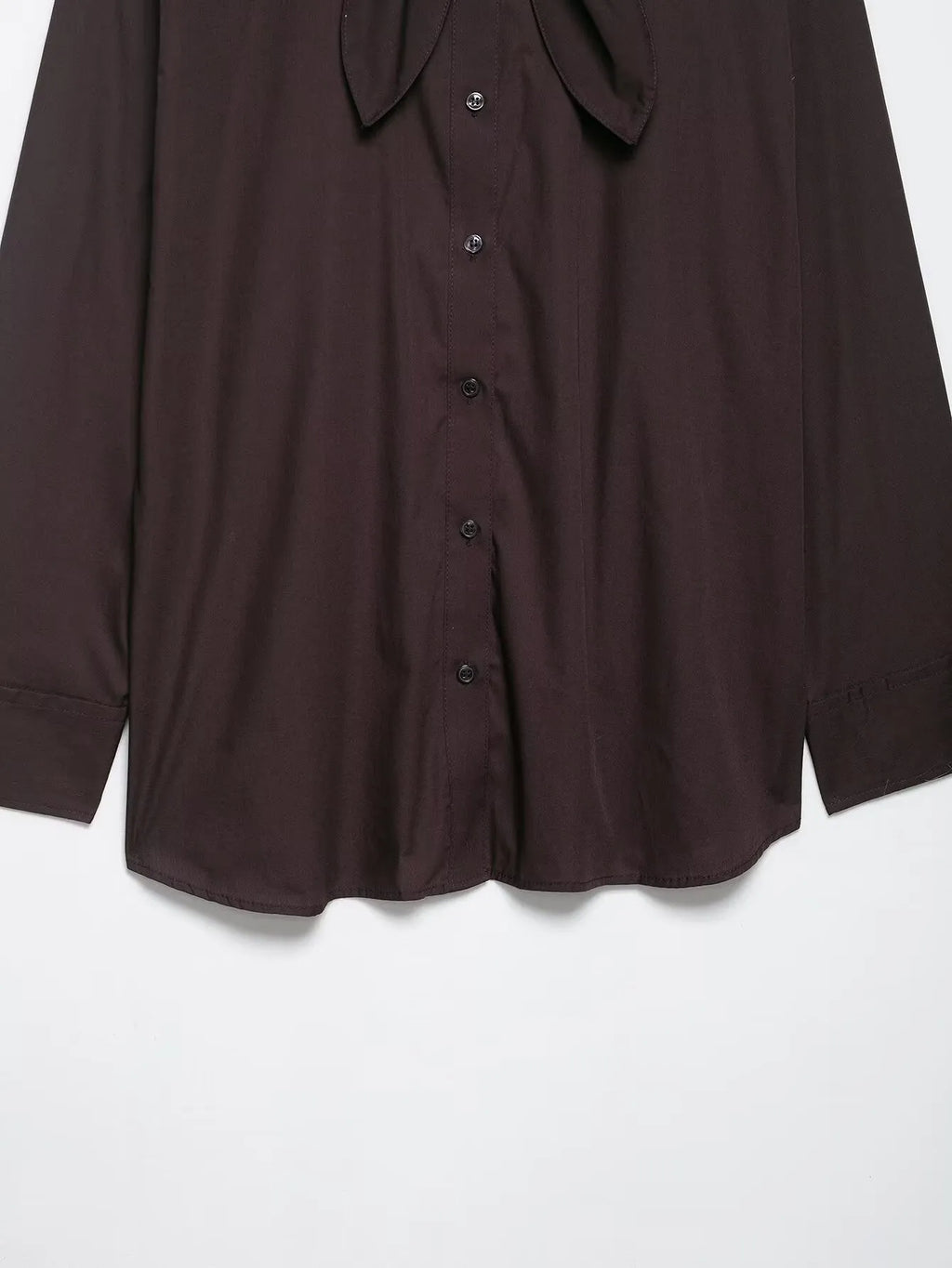 Brown women's poplin shirt with long sleeves, a loose fit, and a bow tie front closure.