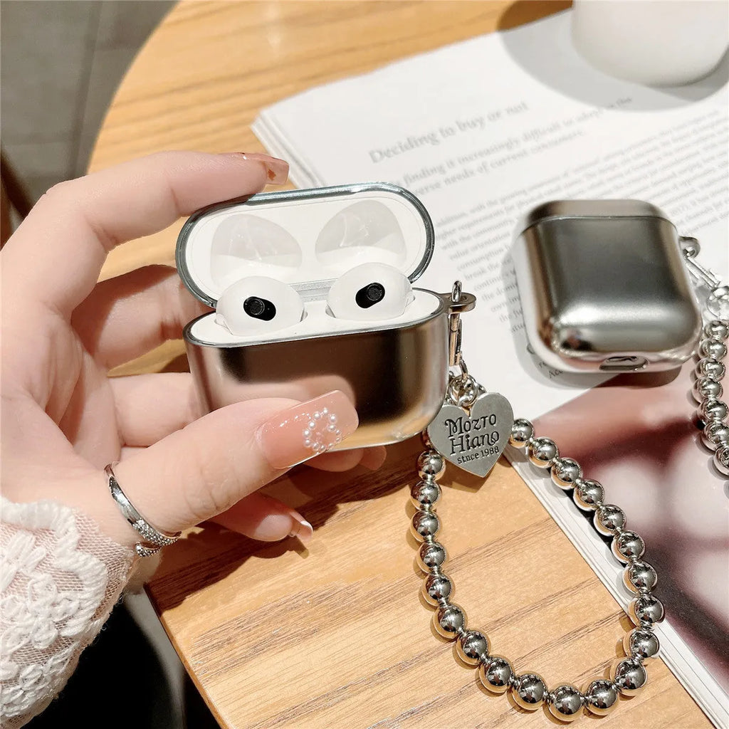 Matte plating protective case for Apple AirPods with an integrated carrying strap.
