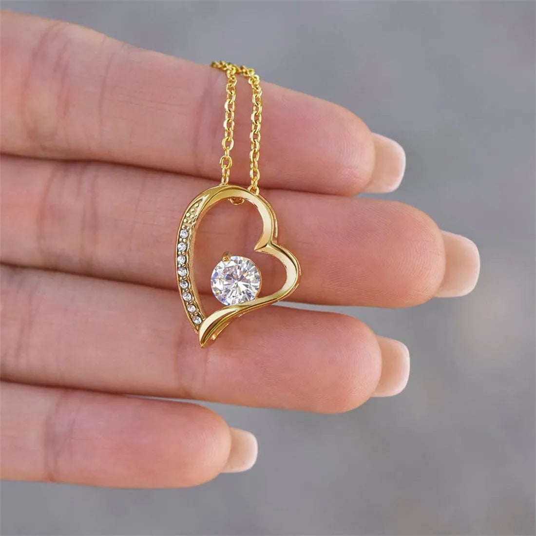 Hollow heart necklace with European styling in silver or gold plating with gift box options
