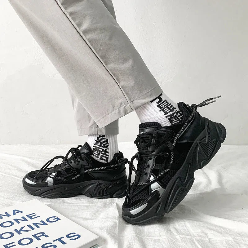 Men's Korean style platform dad sneakers in black, white, and grey colours with front lace-up closure