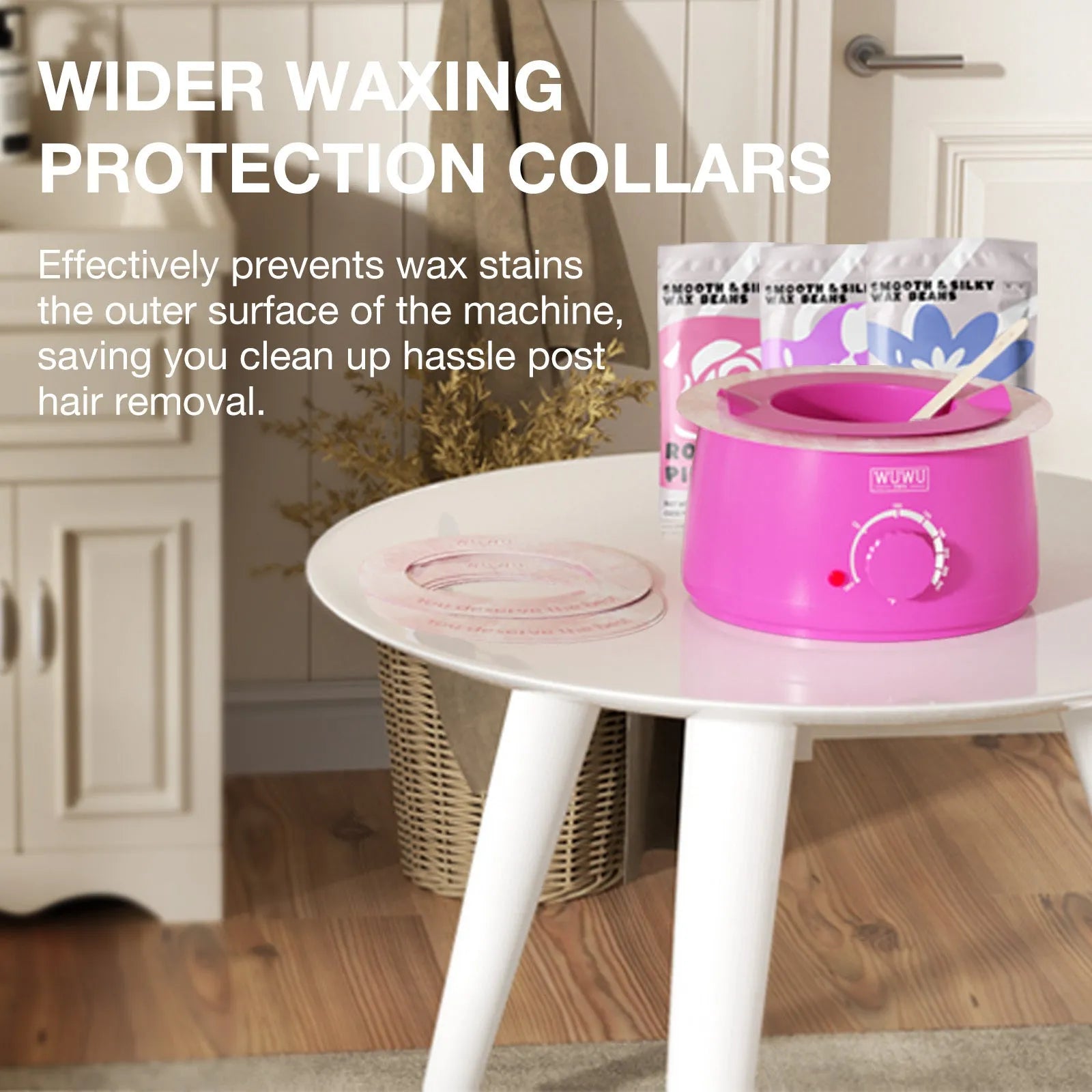 Black and pink professional waxing kit with warmer, hard wax beans, lotion, and application tools laid out.