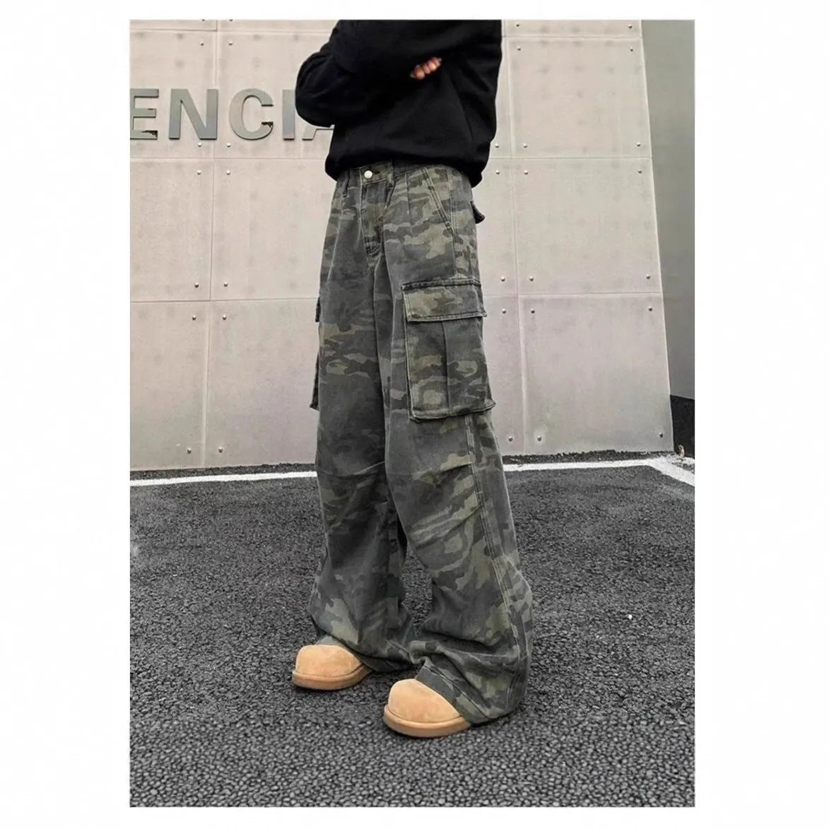American vintage washed camouflage cotton blend cargo pants with multiple pockets on a mid waist.