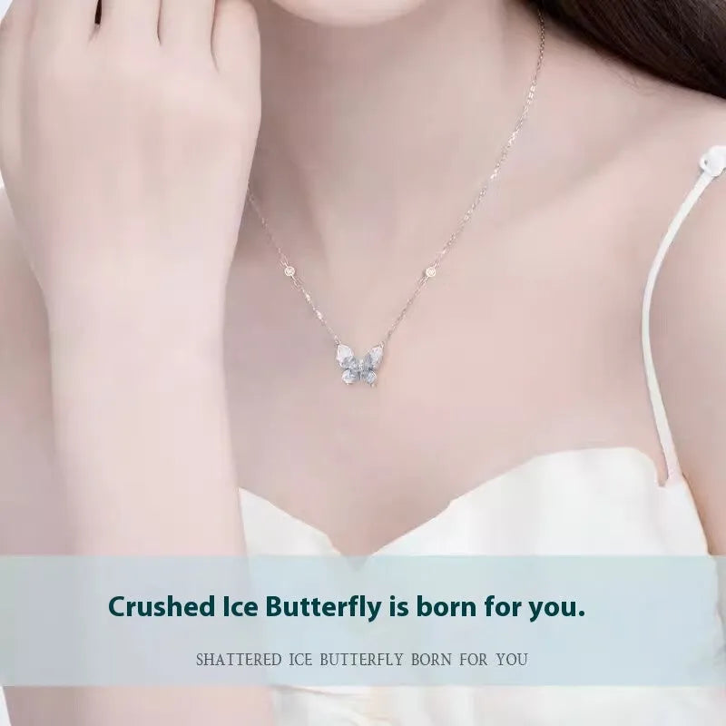 Silver butterfly necklace with adjustable chain showing pendant detail and O-ring links