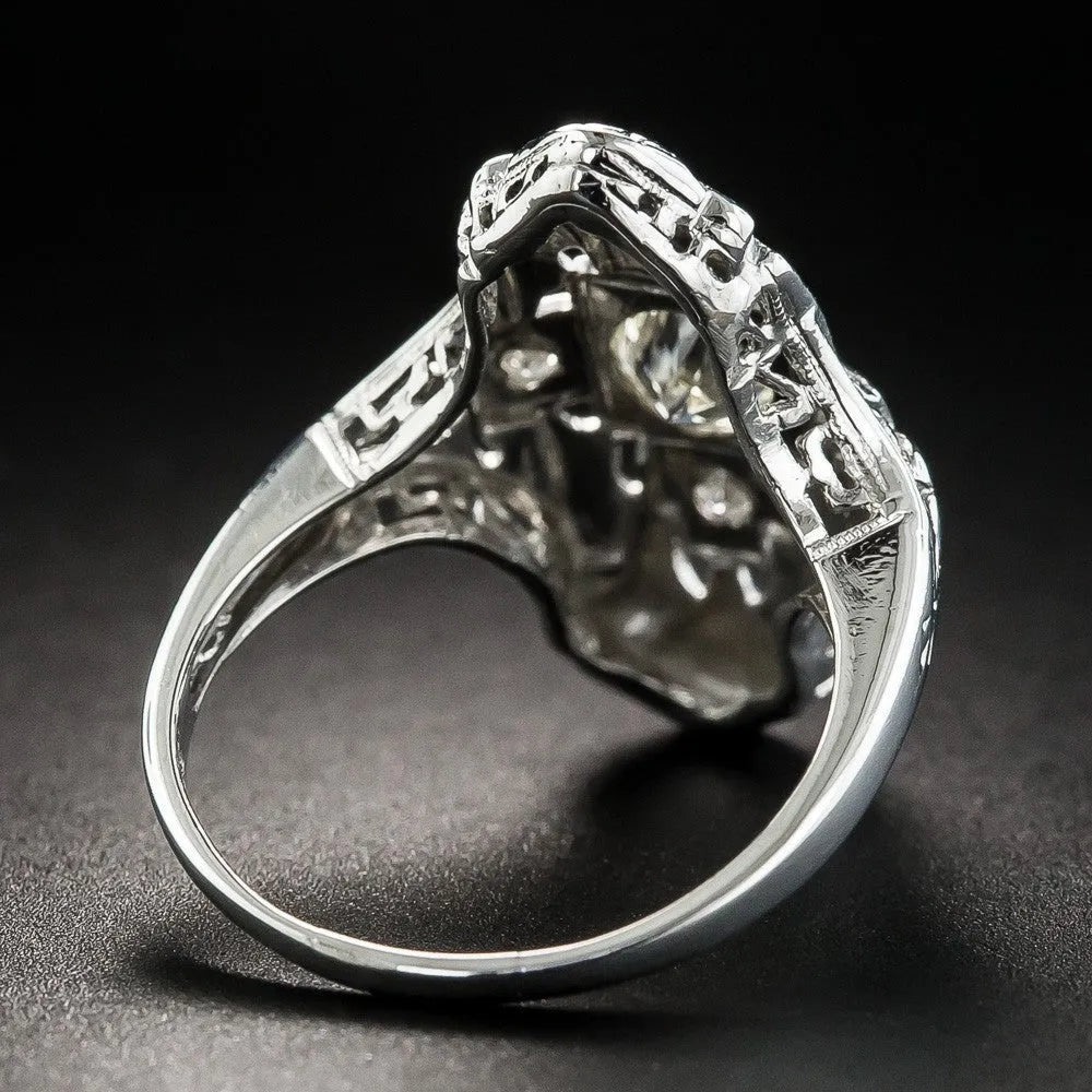 Silver electroplated copper ring with hollow-out geometry pattern and diamond studded detailing
