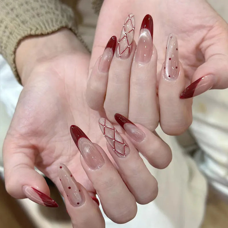 Set of sweet girl themed press-on false nails in assorted random colours and designs.