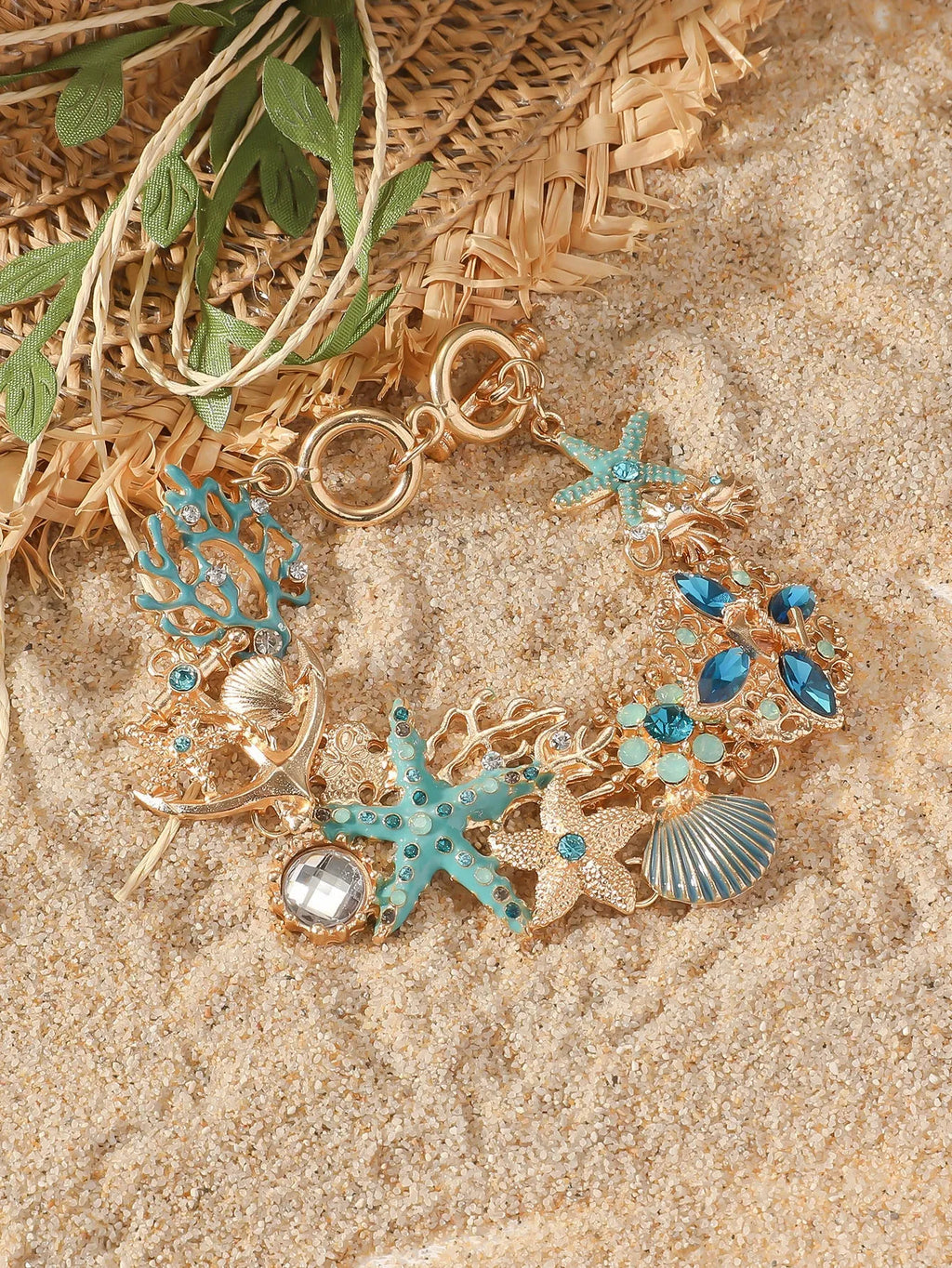 Women's alloy starfish bracelet in turquoise, coral red, or coral blue electroplated colour.