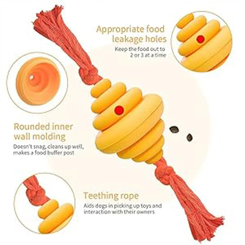 Green and yellow silicone dog ball with integrated rope, shown as a food-dispensing chew and tug toy.