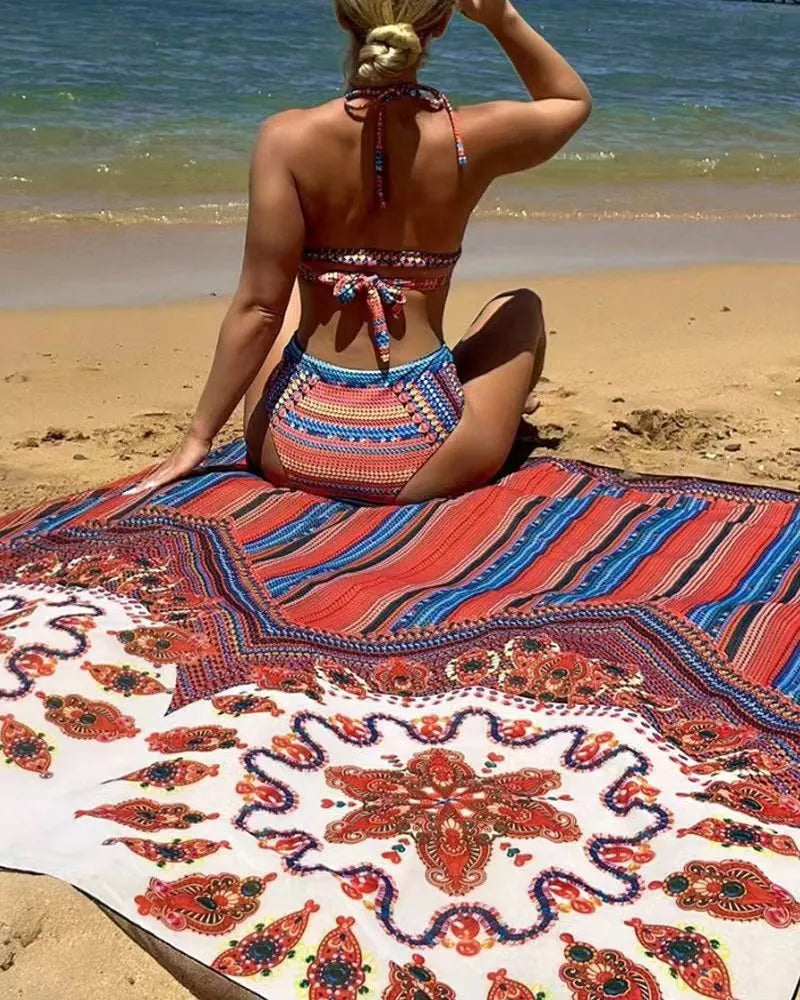 Women's three-piece swimsuit set showing high-waisted briefs, sleeveless cutout top, and coordinating coat