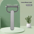 Green and grey dog unknotting comb with PP handle and stainless steel teeth, shown in large and small sizes.