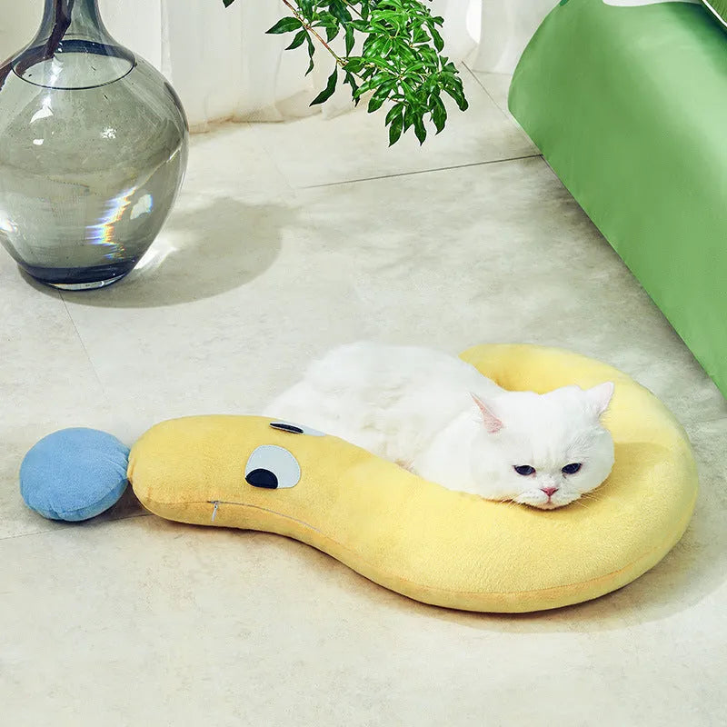 Blue and yellow rectangular pet sleeping pillow for cats and dogs on a white background.