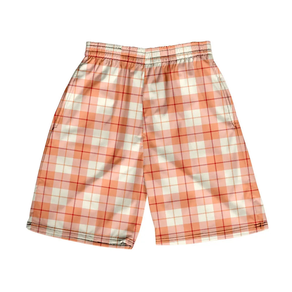 Man wearing straight-fit plaid casual shorts with an elastic waistband.