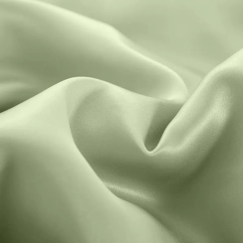 Double-sided silk duvet cover in lotus pink colour showing plain weave texture