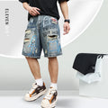 Blue men's denim jeans shorts with graffiti print and ripped details, showing straight leg and zipper fly.