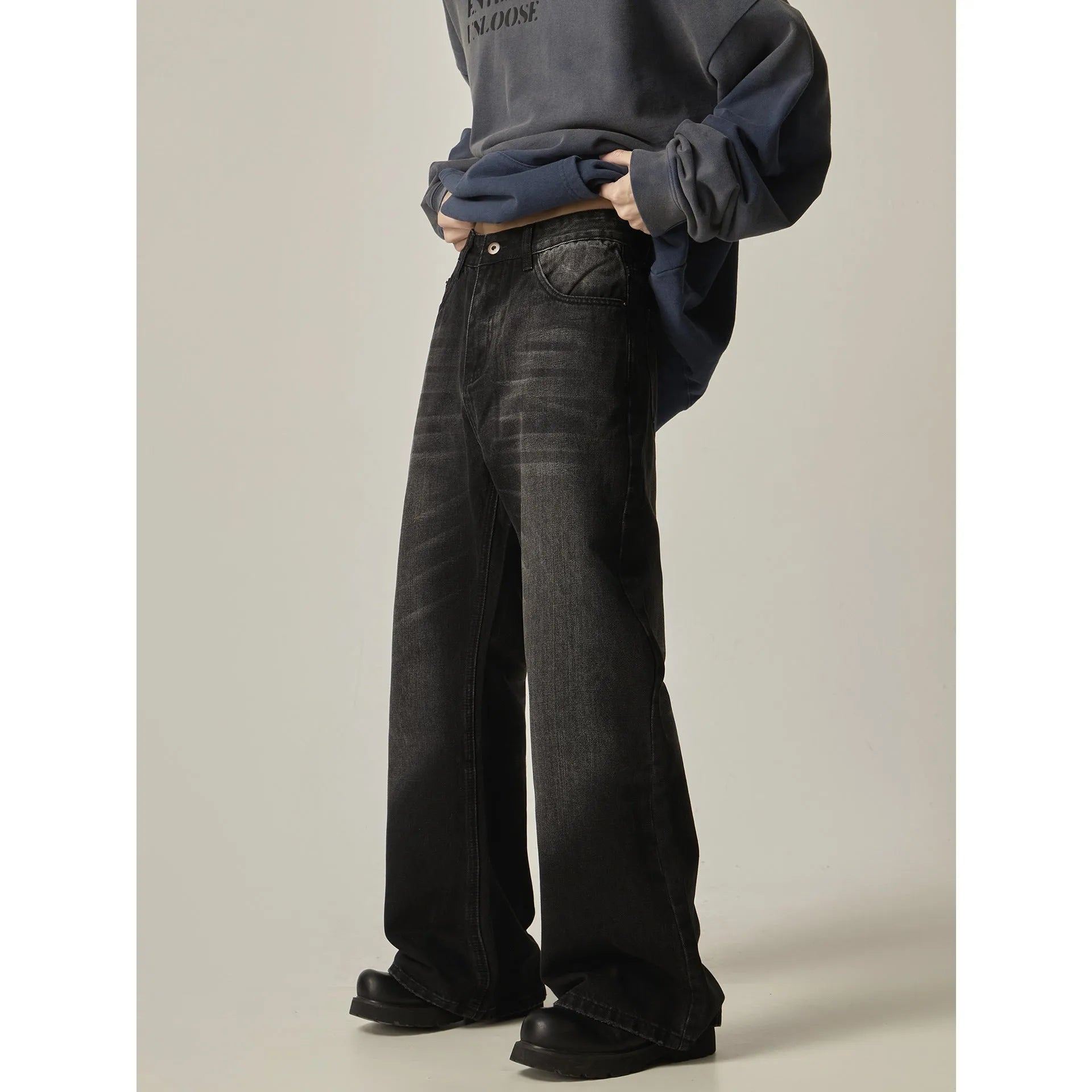 Black loose straight leg jeans with zipper fly and retro styling
