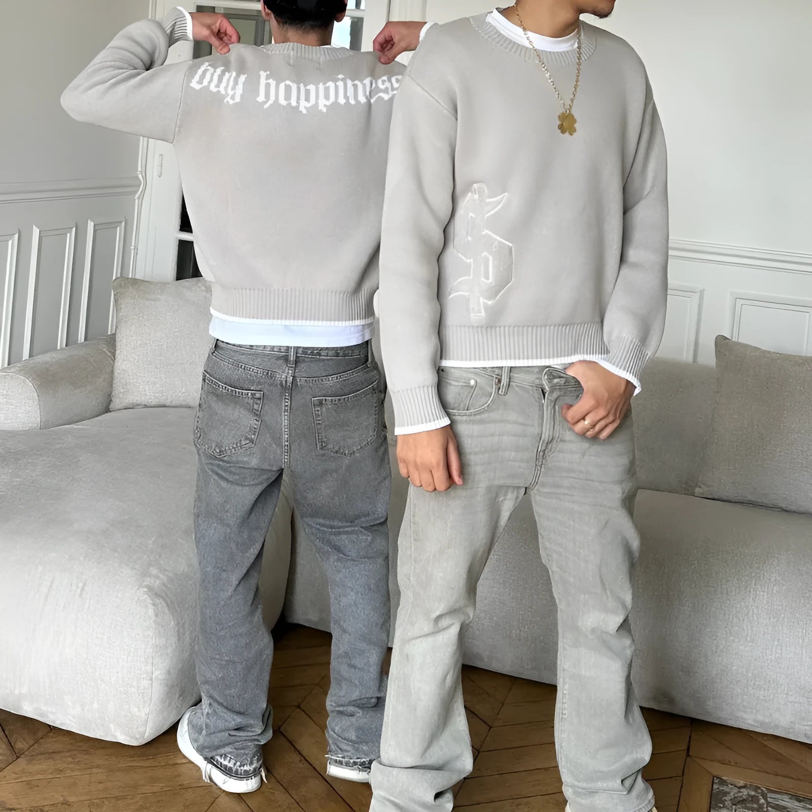 Grey loose-fitting acetate knitwear coat with jacquard pattern and long sleeves.