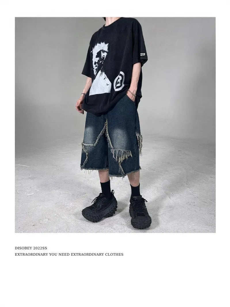 Men's blue retro denim shorts with frayed hem and five-pointed star design, loose fit with knee-length styling